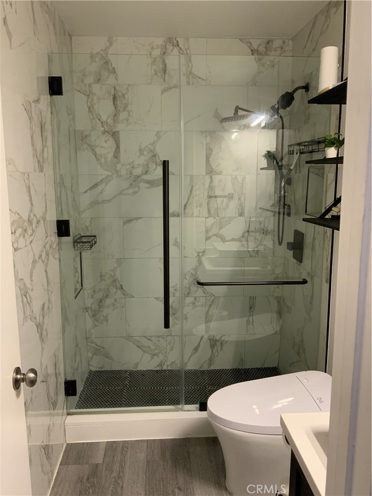 4140 Workman Mill Road, Unit 172 Whittier, CA 90601 - Photo 21 of 21 a bathroom with a shower and a toilet