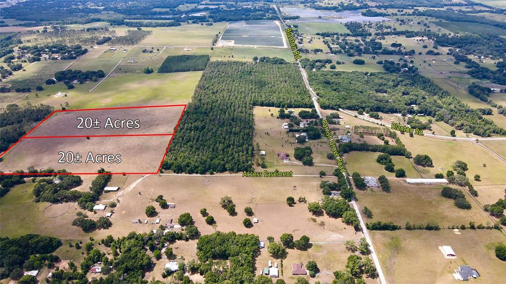 Parrish Grove Road Dade City, FL 33523 - Photo 23 of 23 an aerial view of residential houses with outdoor space