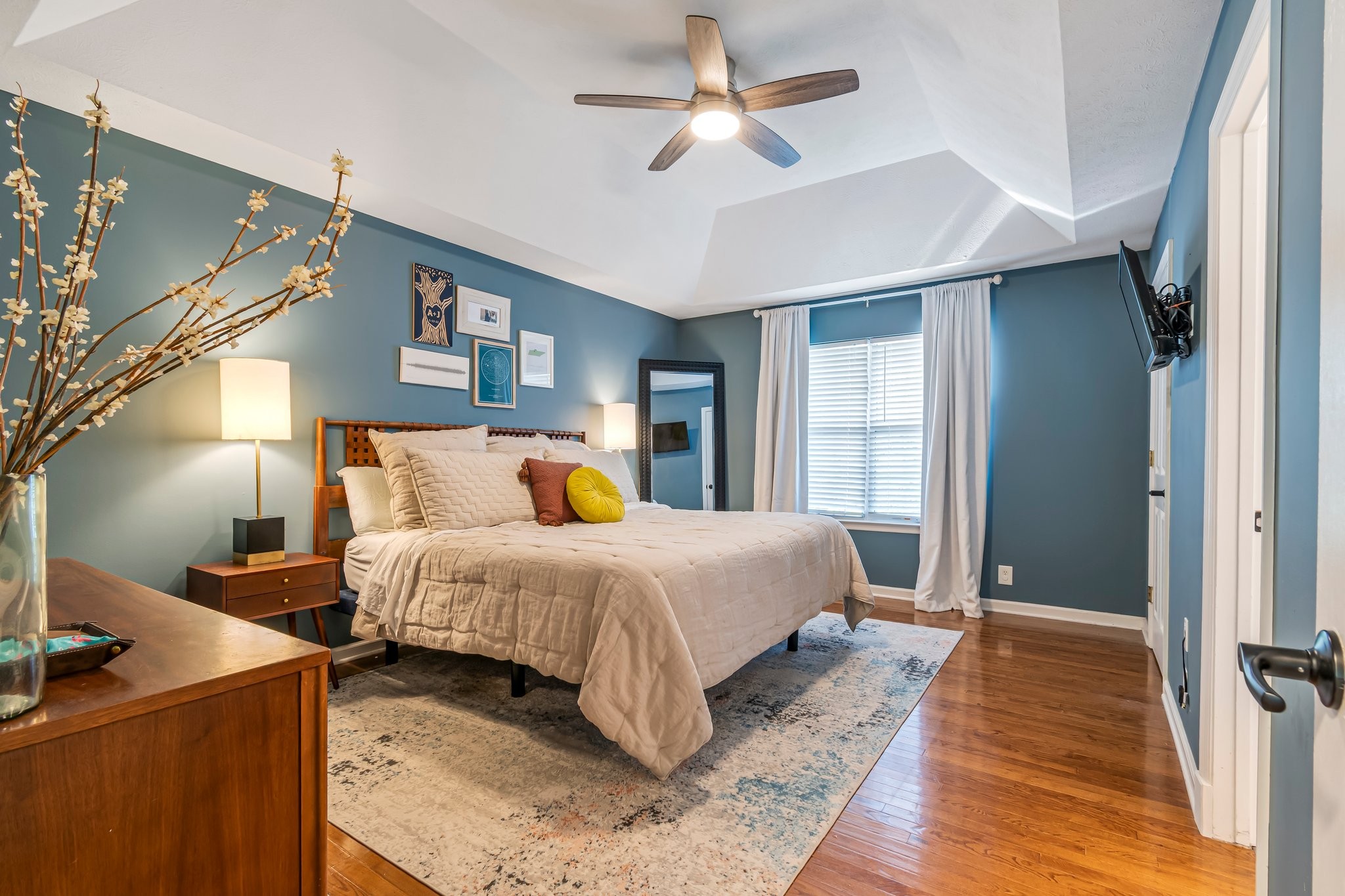 1817 Bryce Circle Nashville, TN 37211 - Photo 30 of 54 a spacious bedroom with a bed and a chandelier