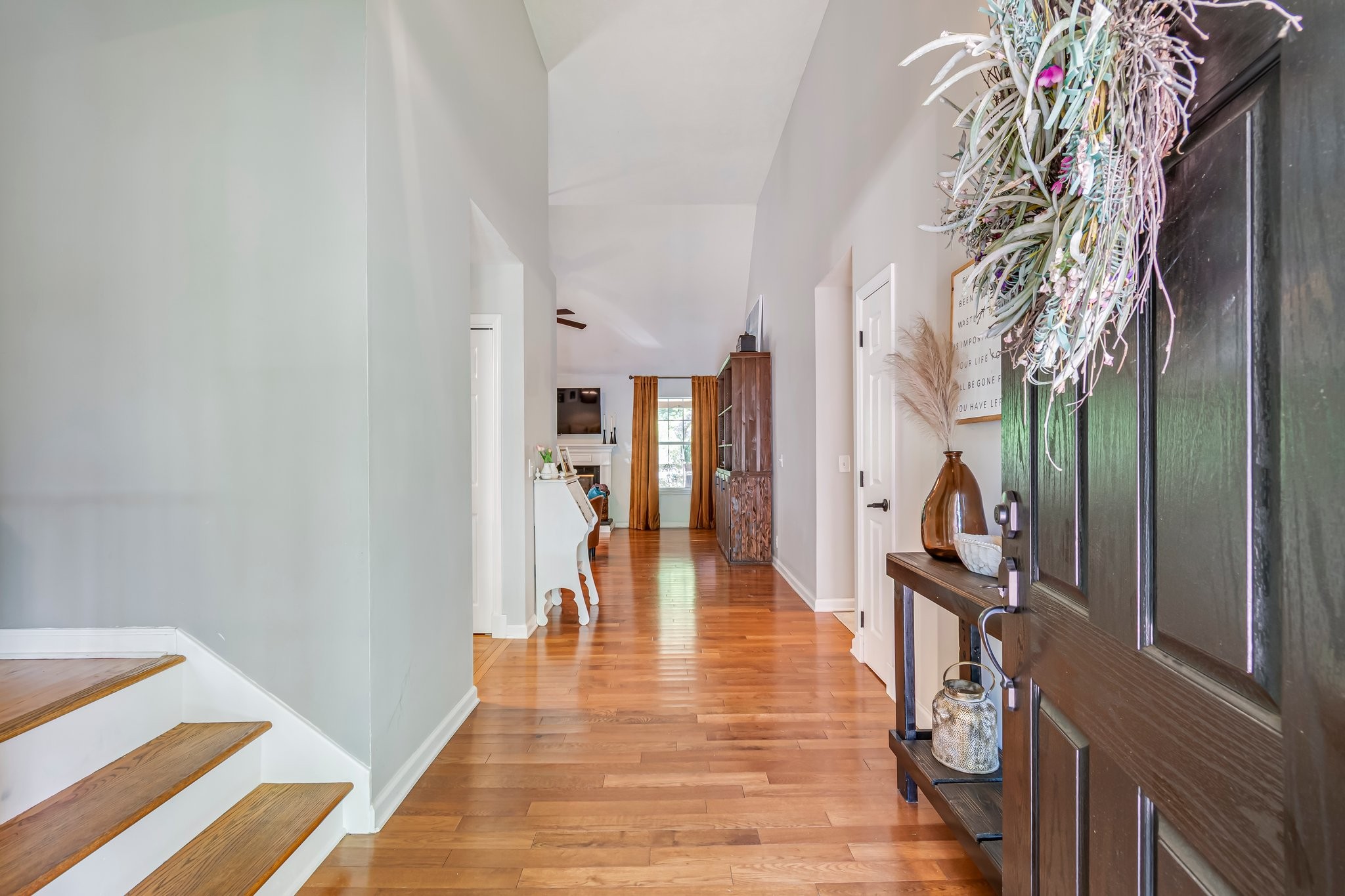 1817 Bryce Circle Nashville, TN 37211 - Photo 3 of 54 a view of a hallway with wooden floor and staircase