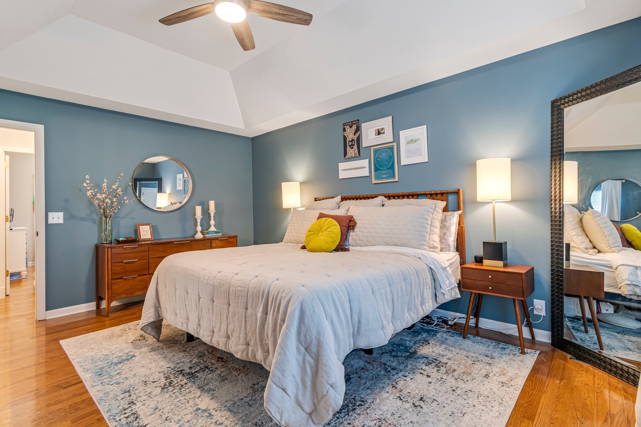 1817 Bryce Circle Nashville, TN 37211 - Photo 33 of 54 a bedroom with a bed lamps and a chandelier