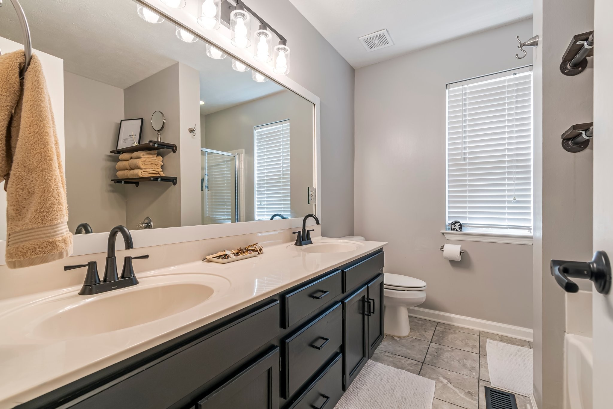 1817 Bryce Circle Nashville, TN 37211 - Photo 34 of 54 a bathroom with a sink and a mirror