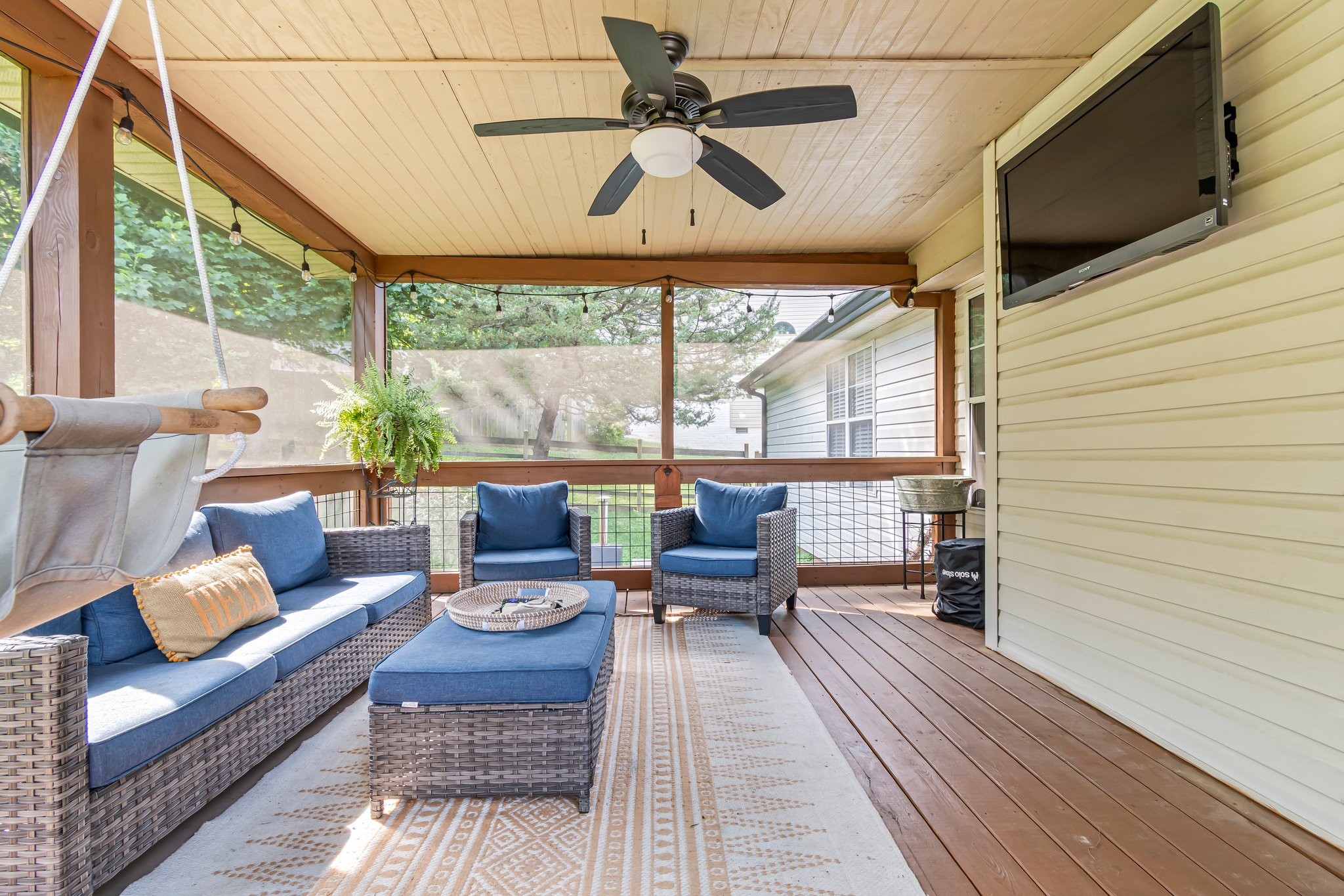 1817 Bryce Circle Nashville, TN 37211 - Photo 46 of 54 a living room with patio furniture and a floor to ceiling window
