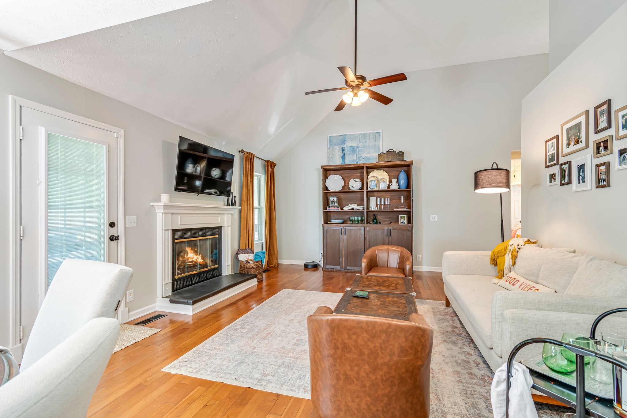 1817 Bryce Circle Nashville, TN 37211 - Photo 7 of 54 a living room with furniture fireplace and flat screen tv