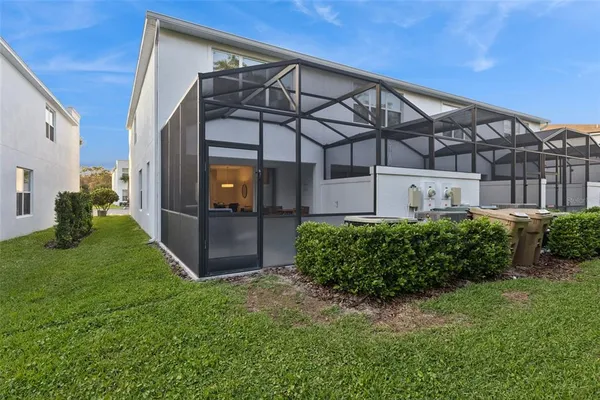 a view of a back yard of the house