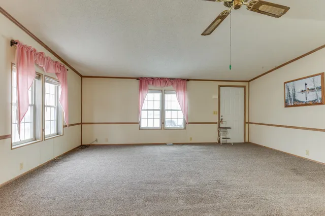 $90,000 | 210 St Ives North, Lansing, MI 48906