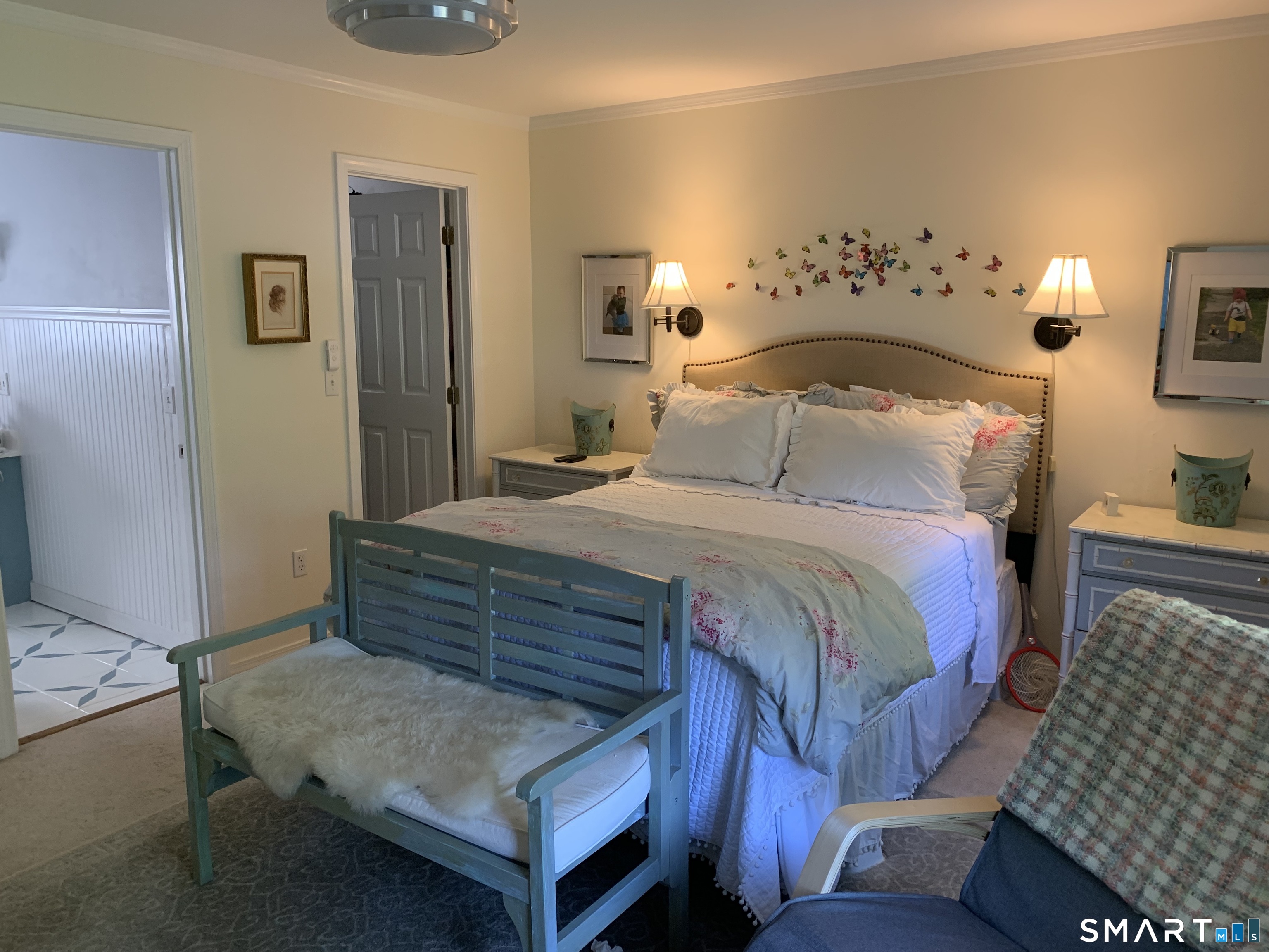 160 Russell Street Groton, CT 06355 - Photo 5 of 7 a bedroom with a bed and a table