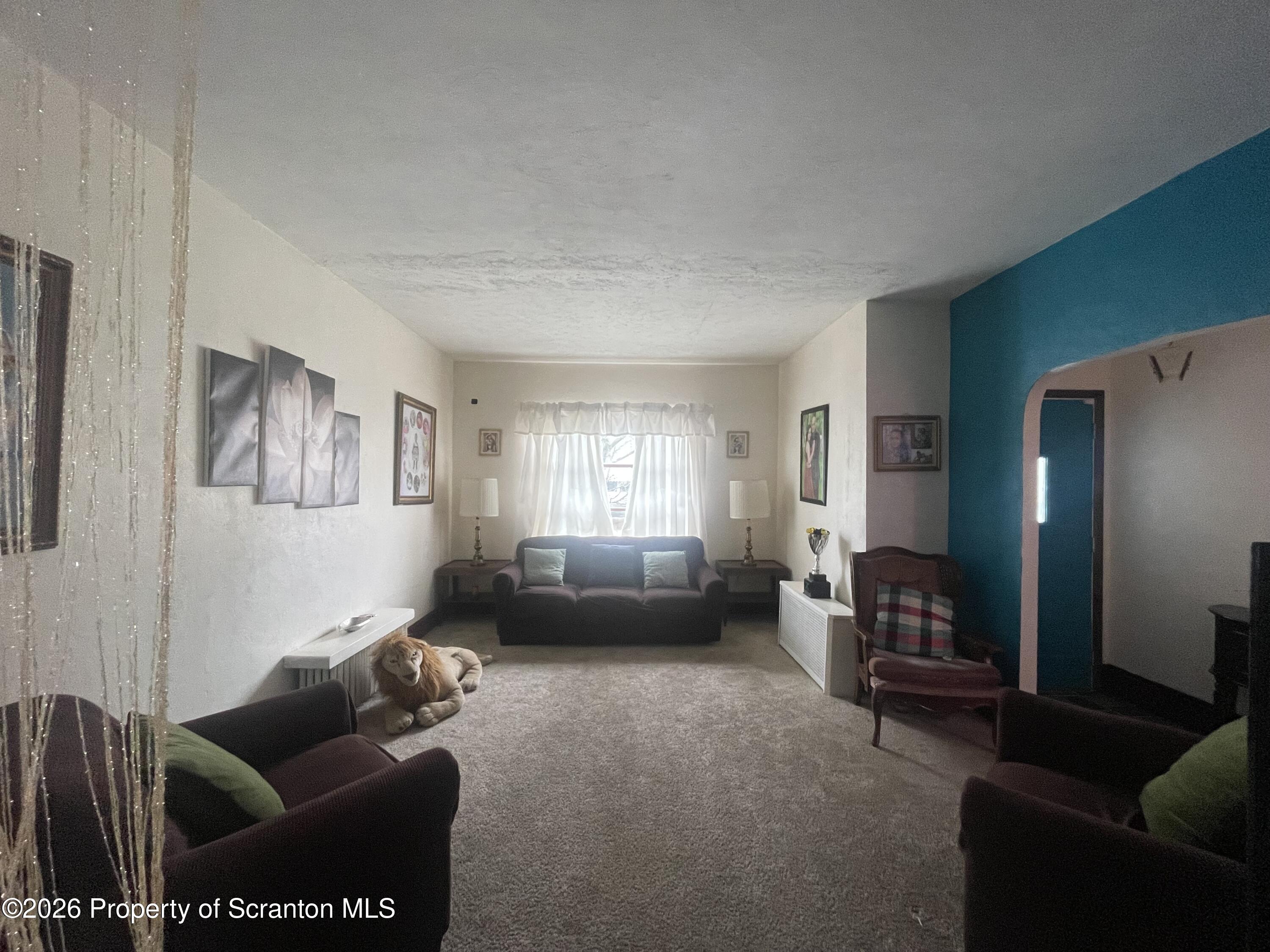 812 Willow Street Scranton, PA 18505 - Photo 12 of 19 a living room with furniture and a couch
