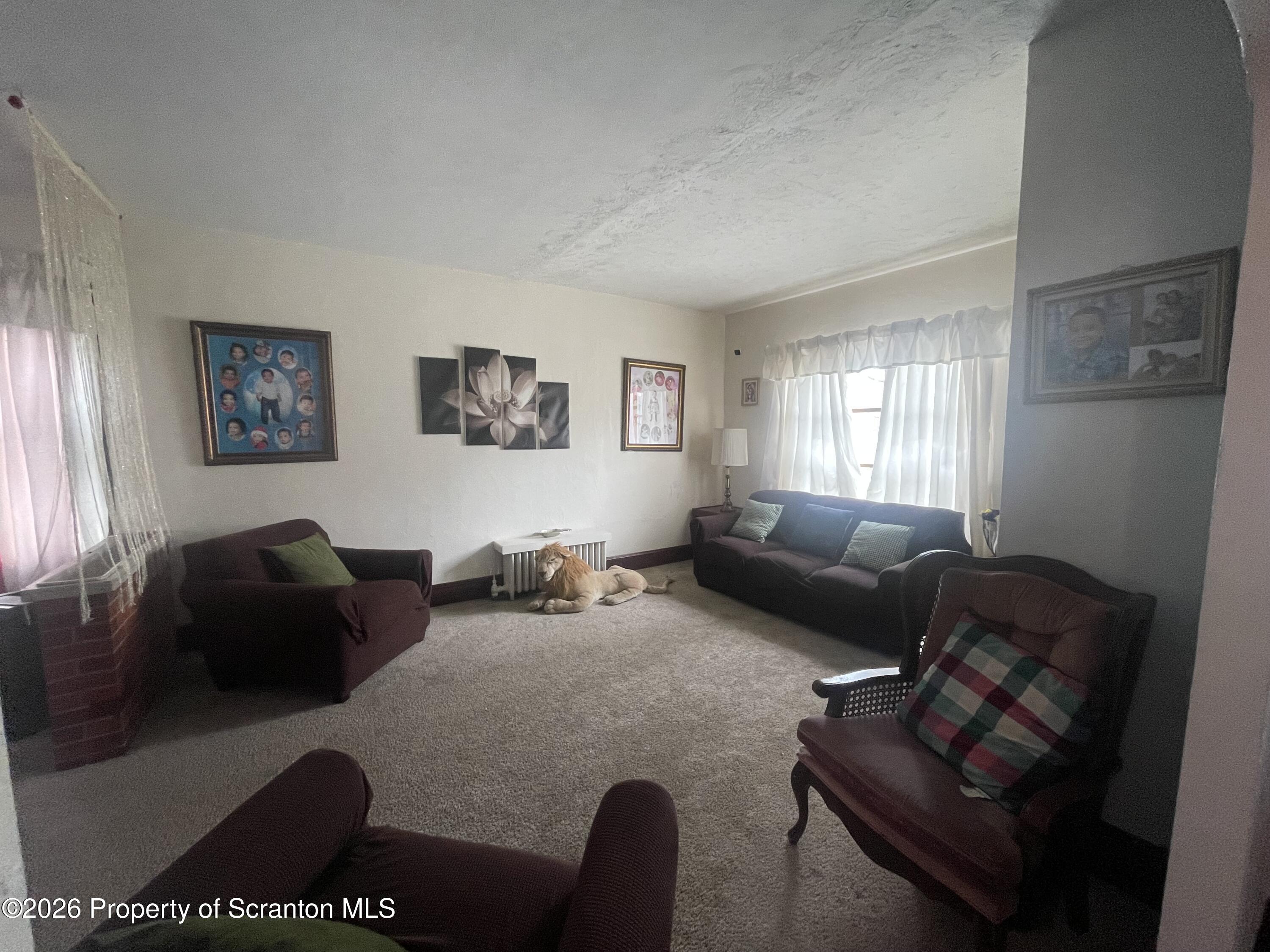 812 Willow Street Scranton, PA 18505 - Photo 10 of 19 a living room with furniture and a window