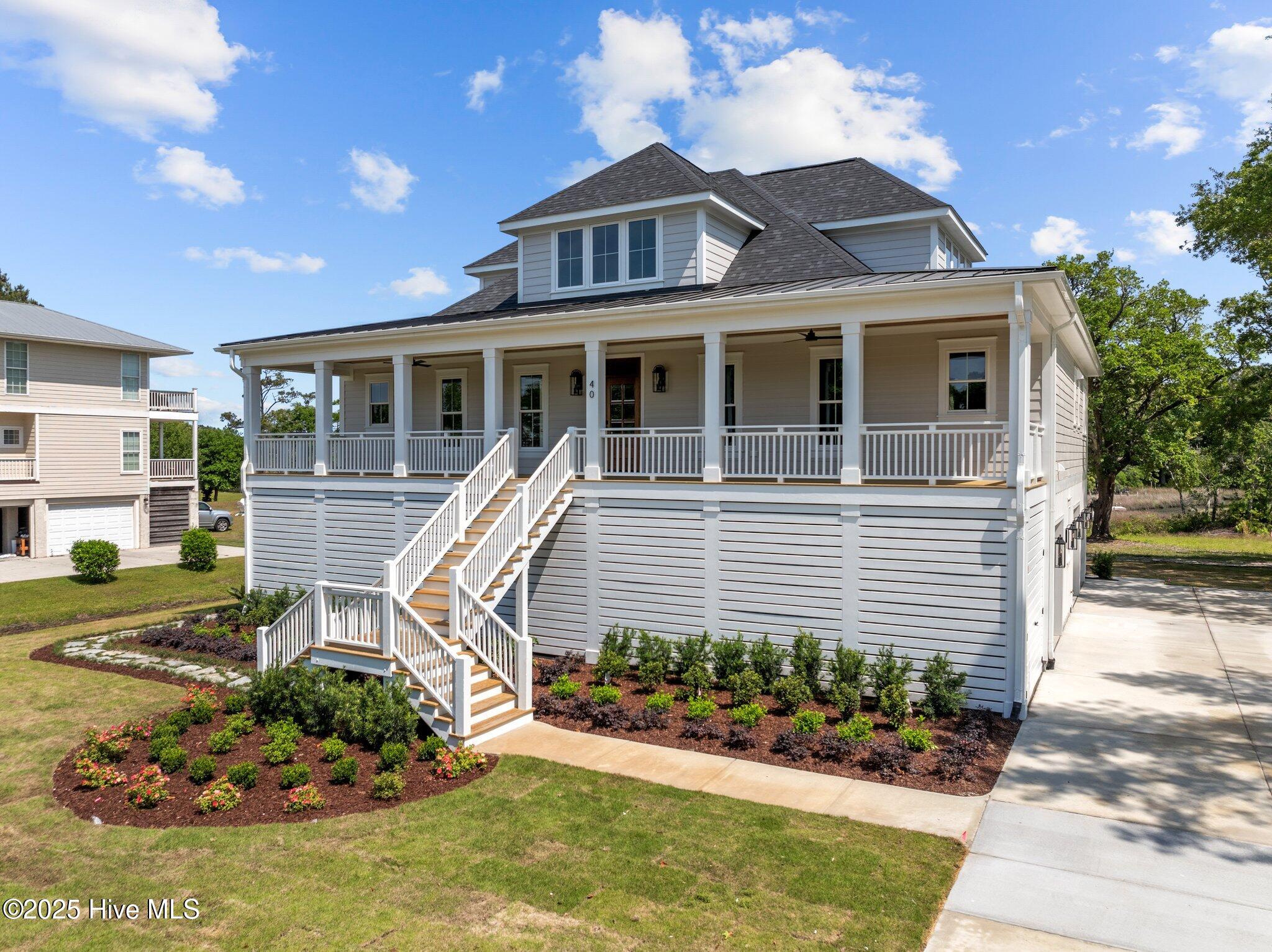 40 Crane Pointe Road Hampstead, NC 28443 - Photo 2 of 62 2-web-or-mls-DJI_20250502085706_0926_D