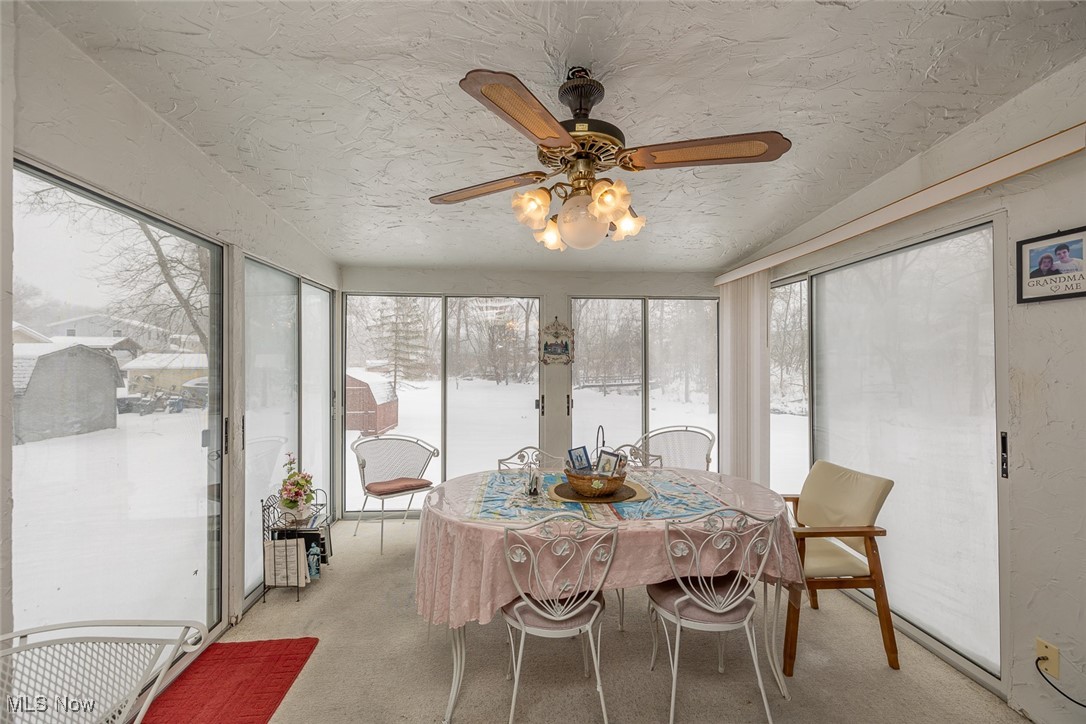 750 Sagamore Road Northfield, OH 44067 - Photo 14 of 37 Sunroom with ceiling fan