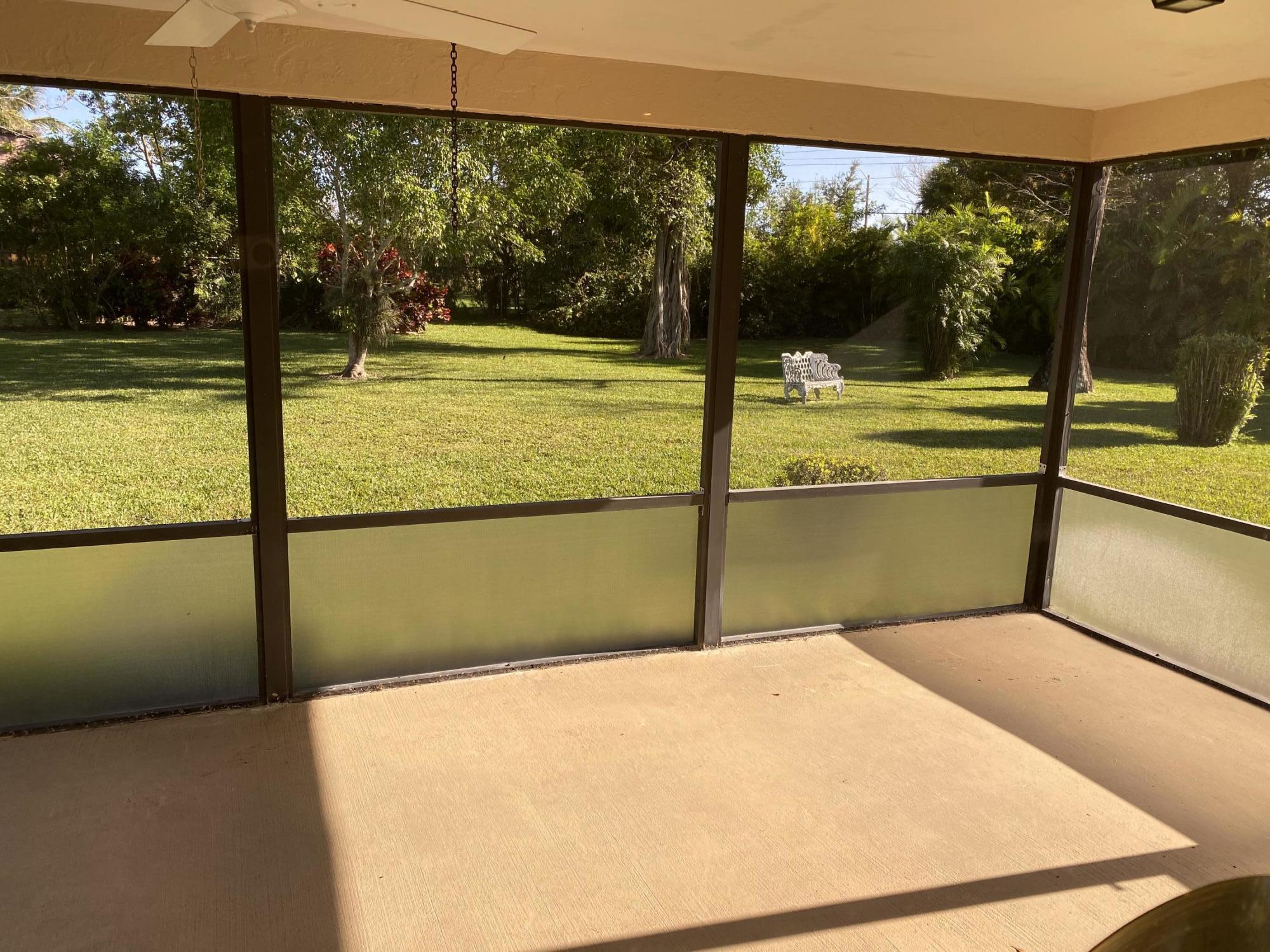 7968 Cloverfield Circle Boca Raton, FL 33433 - Photo 11 of 13 Screened Patio