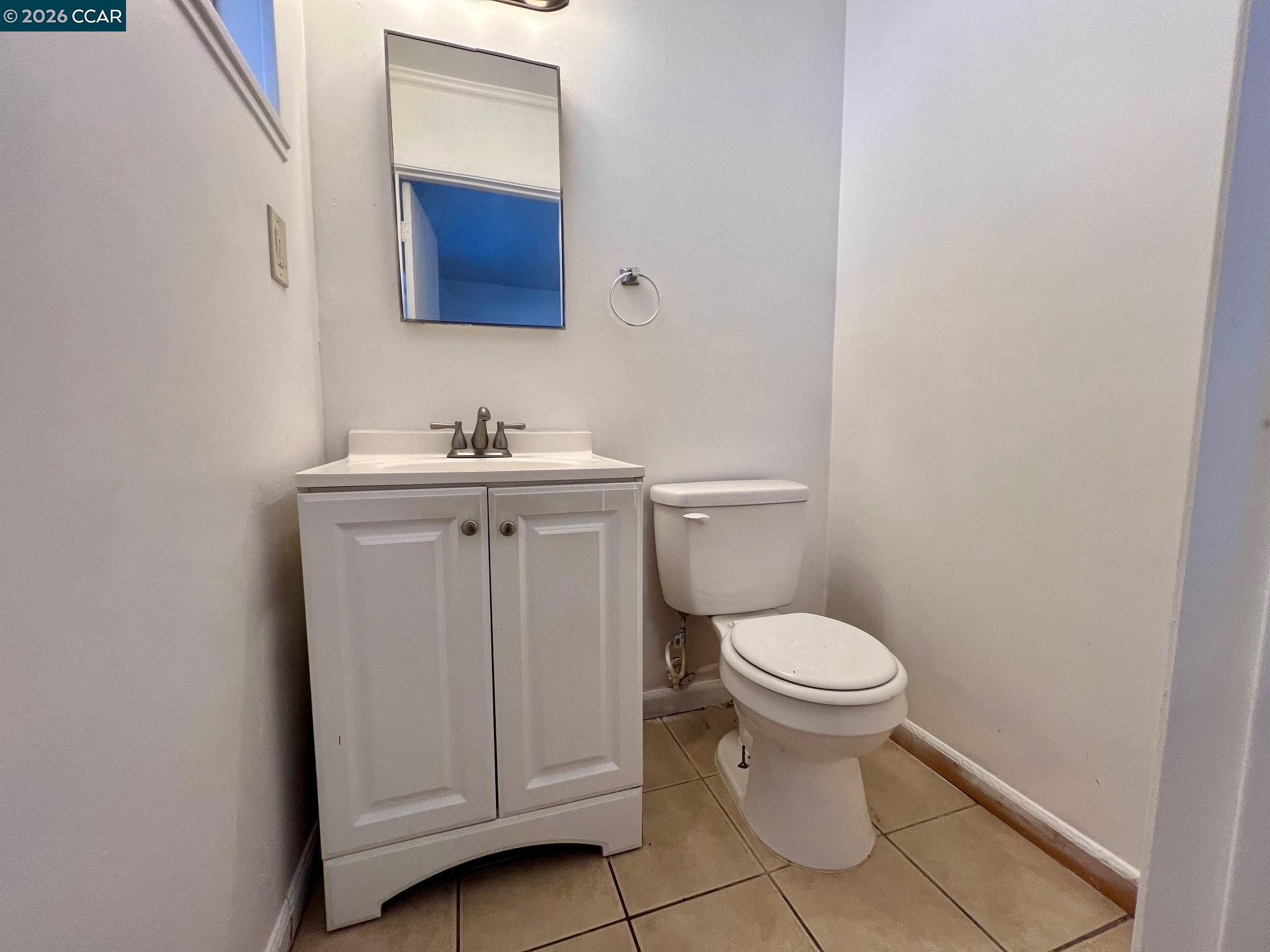 29 Sandview Drive Bay Point, CA 94565 - Photo 15 of 26 a bathroom with a toilet sink and mirror