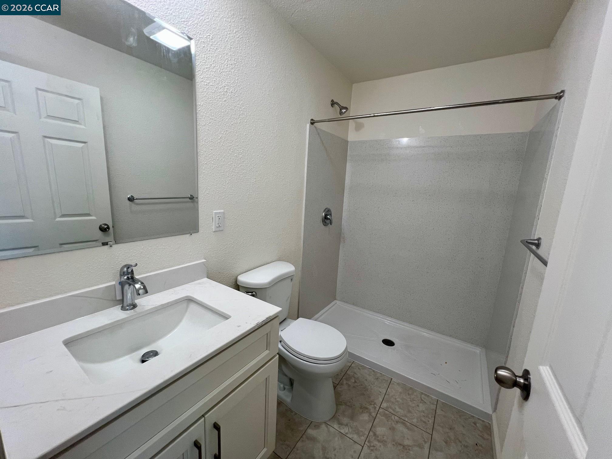 29 Sandview Drive Bay Point, CA 94565 - Photo 25 of 26 a bathroom with a sink toilet and shower