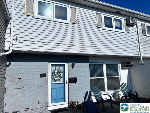 a front view of a house with entryway