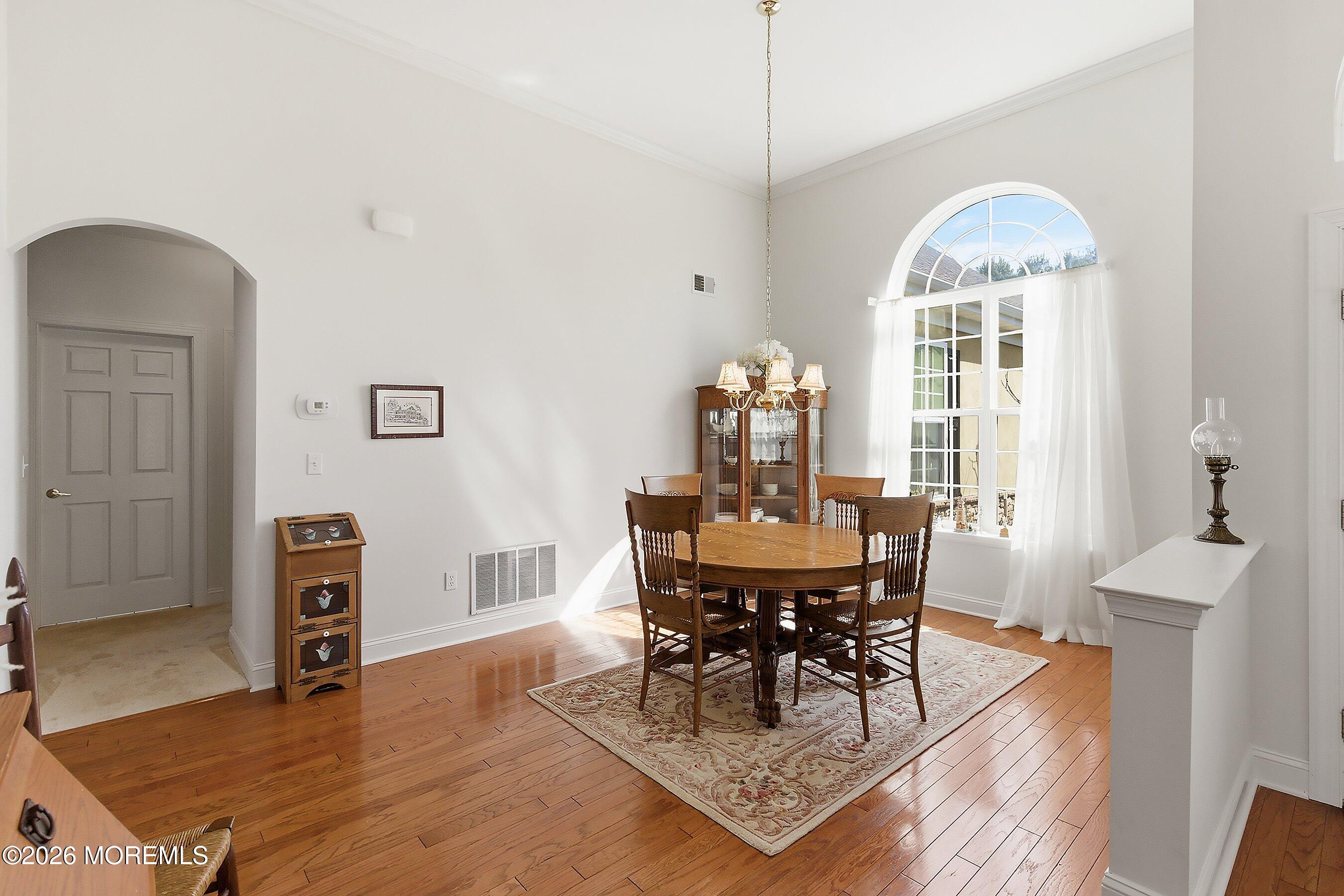 65 Mission Way Barnegat, NJ 08005 - Photo 13 of 51 a view of a dining room with furniture window and wooden floor
