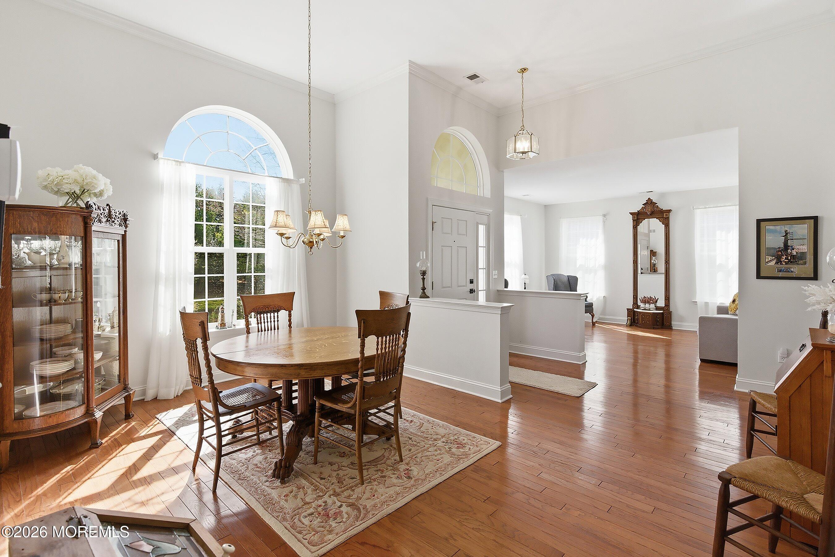 65 Mission Way Barnegat, NJ 08005 - Photo 14 of 51 a view of a dining room with furniture window and wooden floor