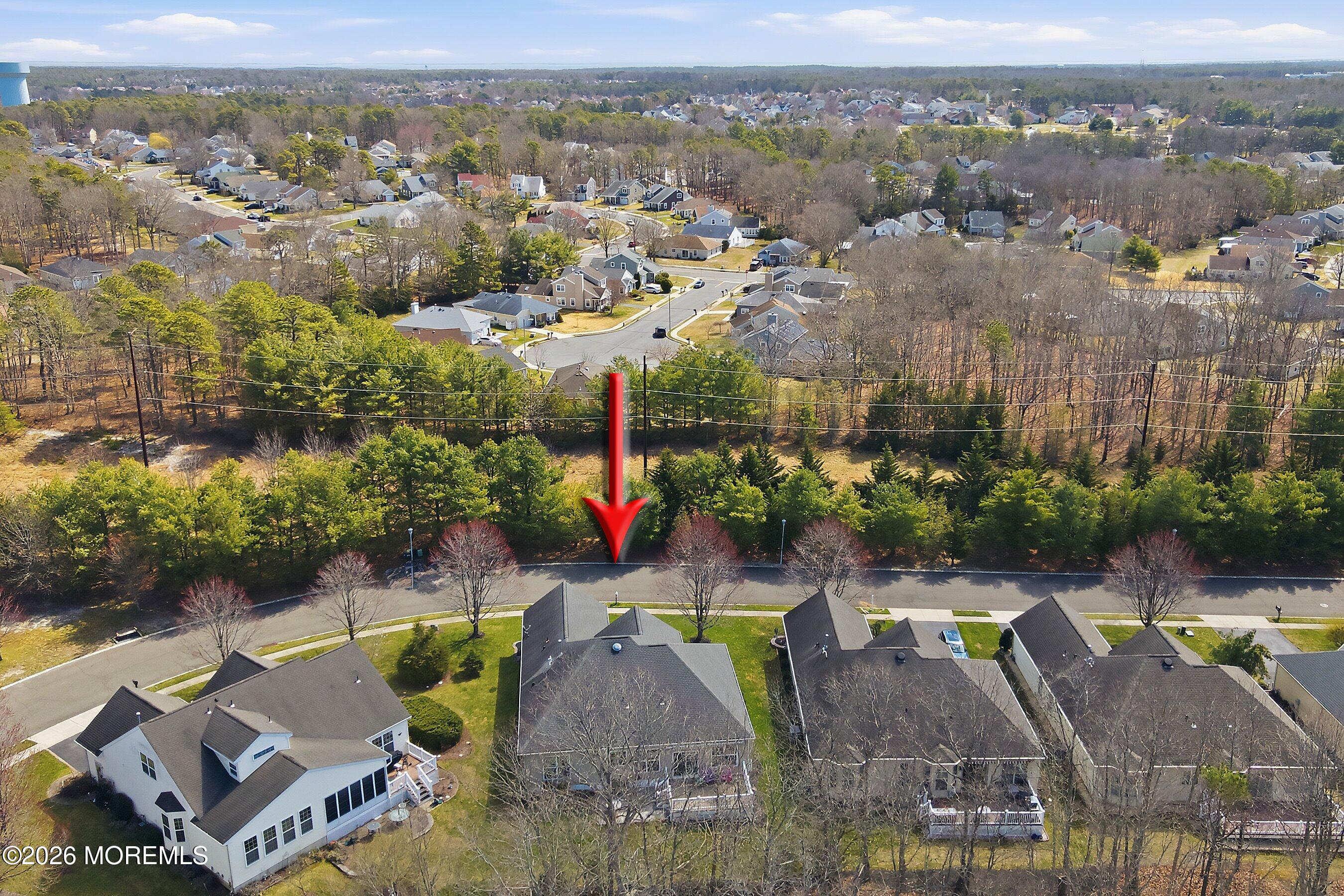 65 Mission Way Barnegat, NJ 08005 - Photo 28 of 51 an aerial view of a swimming pool with outdoor seating and yard