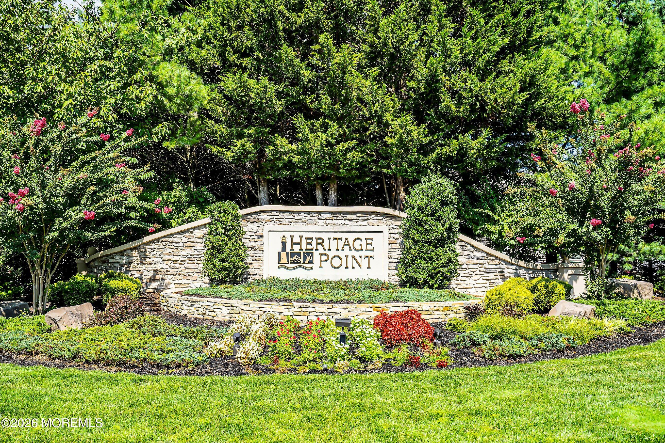 65 Mission Way Barnegat, NJ 08005 - Photo 50 of 51 a sign of golf club on a wall under a tree