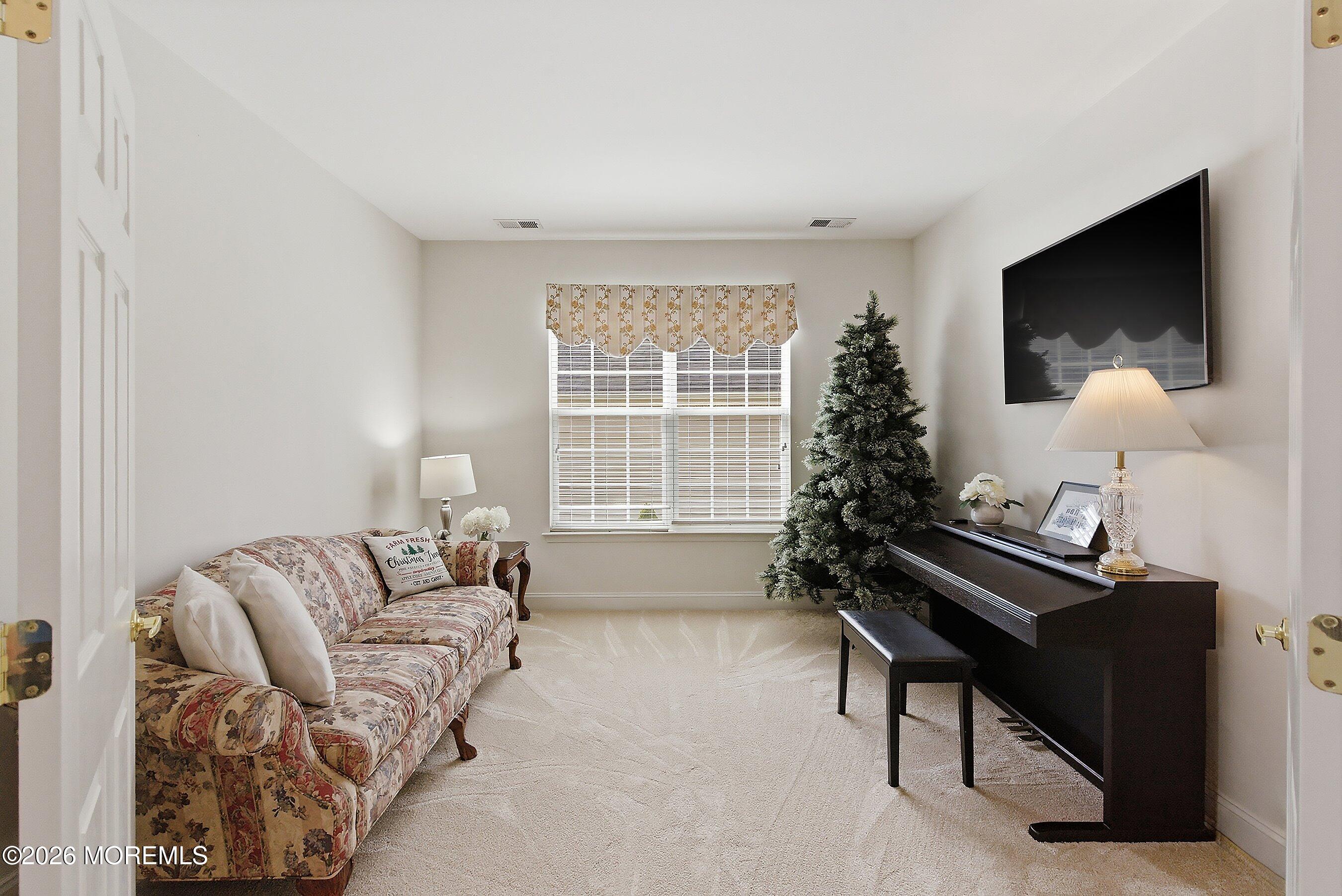65 Mission Way Barnegat, NJ 08005 - Photo 9 of 51 a living room with furniture and a window