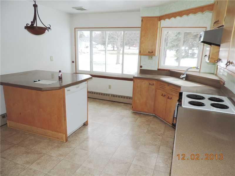 655 Wallace Run Road Big Beaver, PA 15010 - Photo 8 of 24 Kitchen. The light and bright kitchen is sure to please the family chef! Island with breakfast bar and lots of counter and cabinet space