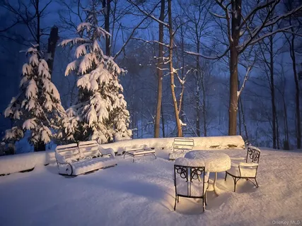 a view of outdoor space with patio furniture and potted plants