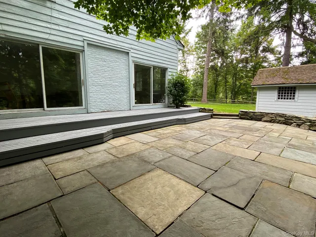 a view of a house with a patio