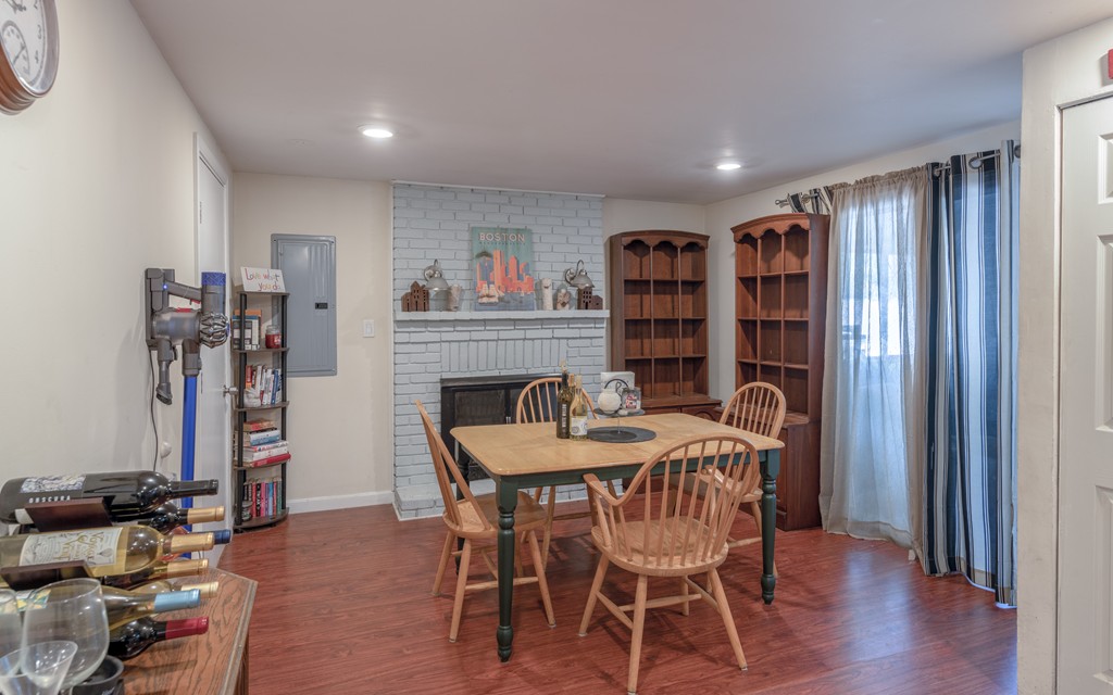 40 Christopher Road Brockton, MA 02302 - Photo 12 of 27 a dining room with furniture and wooden floor