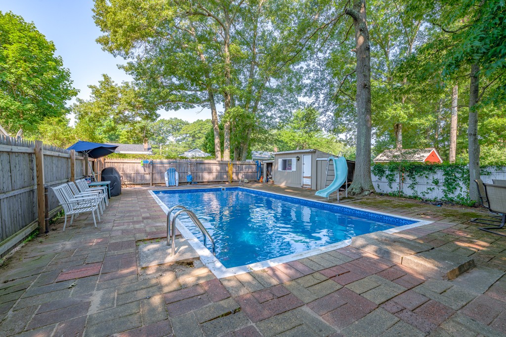 40 Christopher Road Brockton, MA 02302 - Photo 19 of 27 a view of a swimming pool with a patio