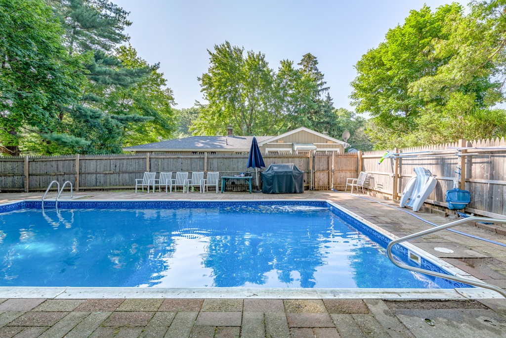 40 Christopher Road Brockton, MA 02302 - Photo 23 of 27 a view of a house with a swimming pool