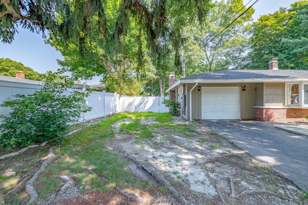 40 Christopher Road Brockton, MA 02302 - Photo 3 of 27 a view of a house with a yard and tree