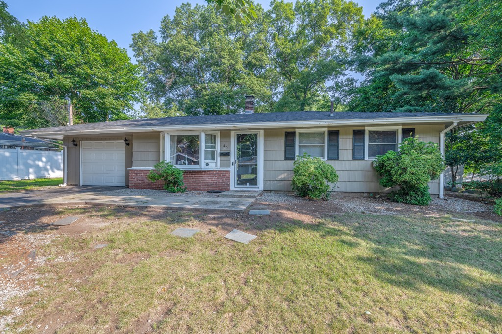 40 Christopher Road Brockton, MA 02302 - Photo 4 of 27 front view of a house with a yard