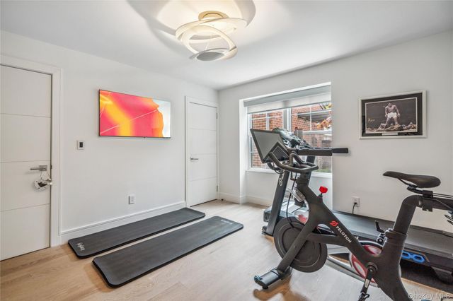 a view of a room with gym equipment