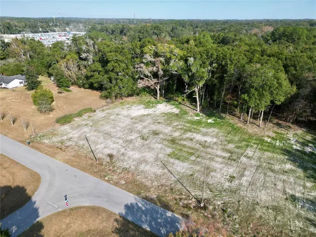 a view of a yard with an outdoor space