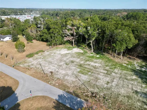a view of a yard with an outdoor space