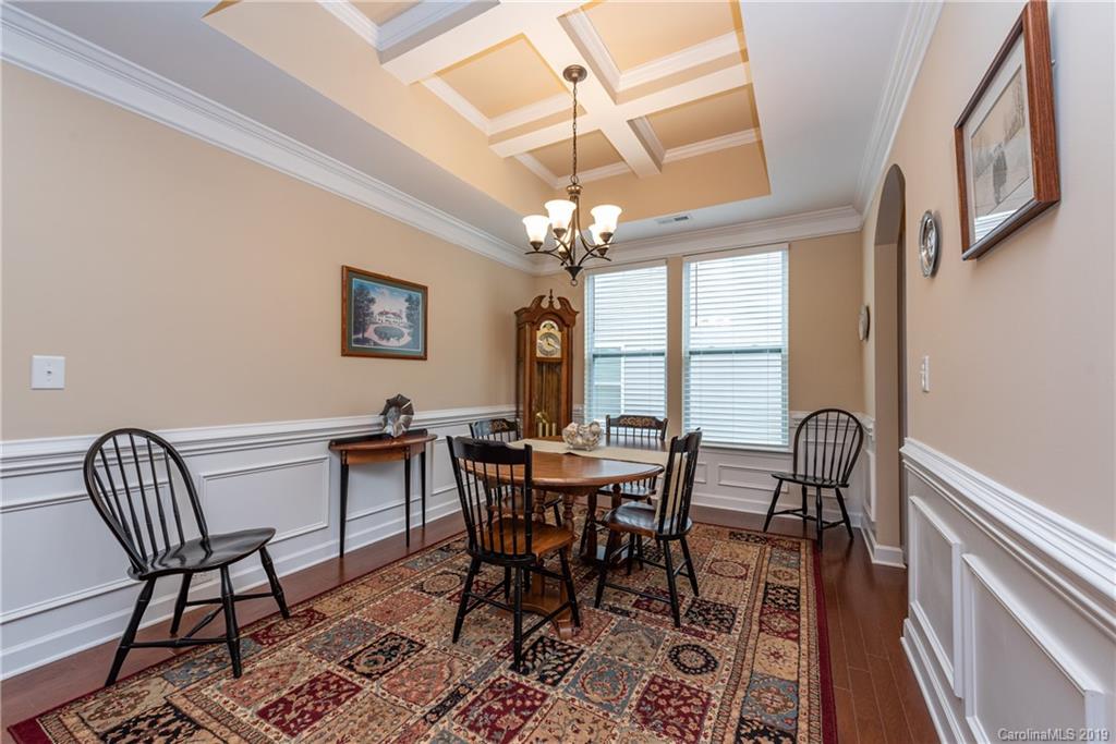78008 Rillstone Drive Lancaster, SC 29720 - Photo 14 of 34 a view of a dining room with furniture and a chandelier