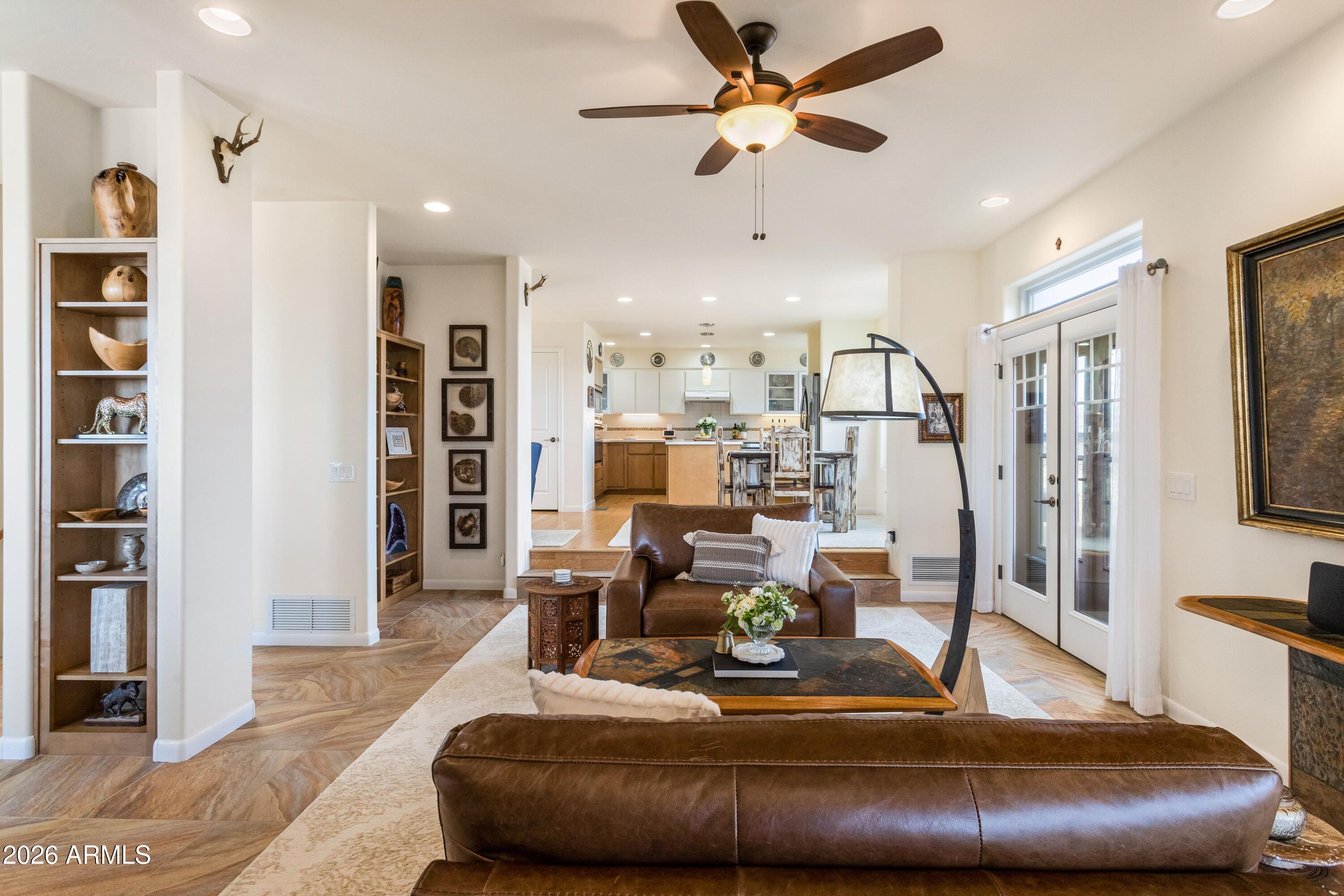8541 South Almosta Ranch Road Hereford, AZ 85615 - Photo 16 of 53 a living room with furniture and a view of kitchen