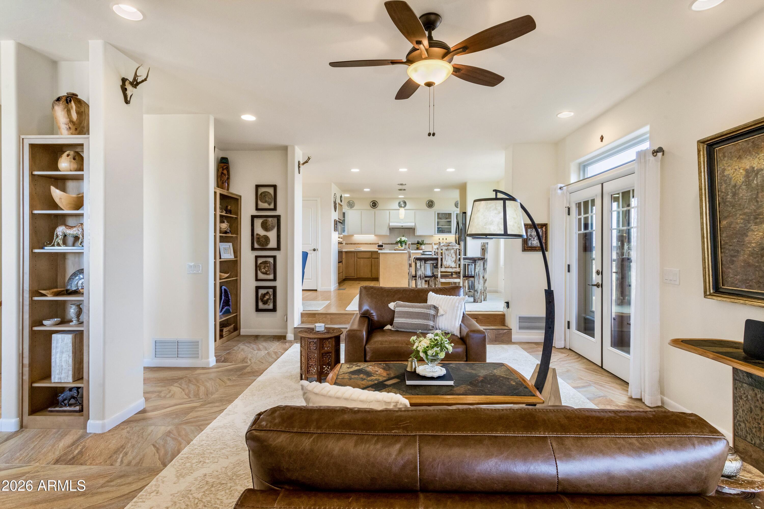 8541 South Almosta Ranch Road Hereford, AZ 85615 - Photo 19 of 53 a living room with furniture and kitchen view