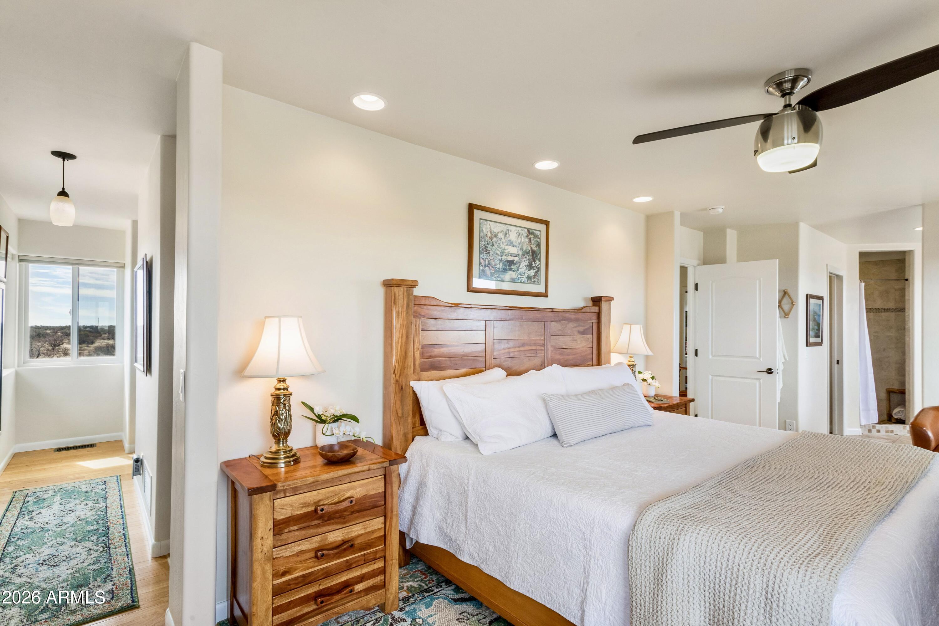 8541 South Almosta Ranch Road Hereford, AZ 85615 - Photo 24 of 53 a bedroom with bed and a window