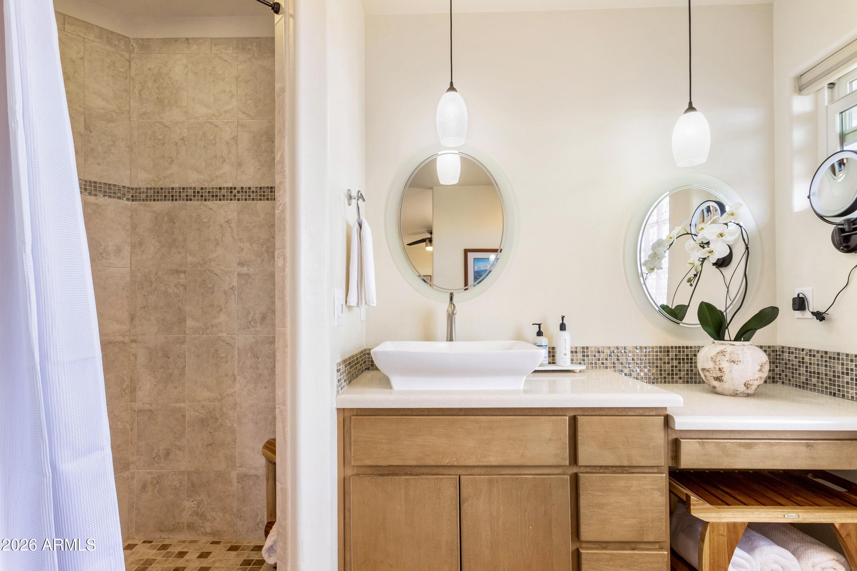 8541 South Almosta Ranch Road Hereford, AZ 85615 - Photo 29 of 53 a bathroom with a sink and a mirror