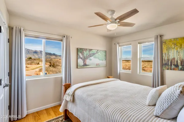 a bedroom with a bed and furniture