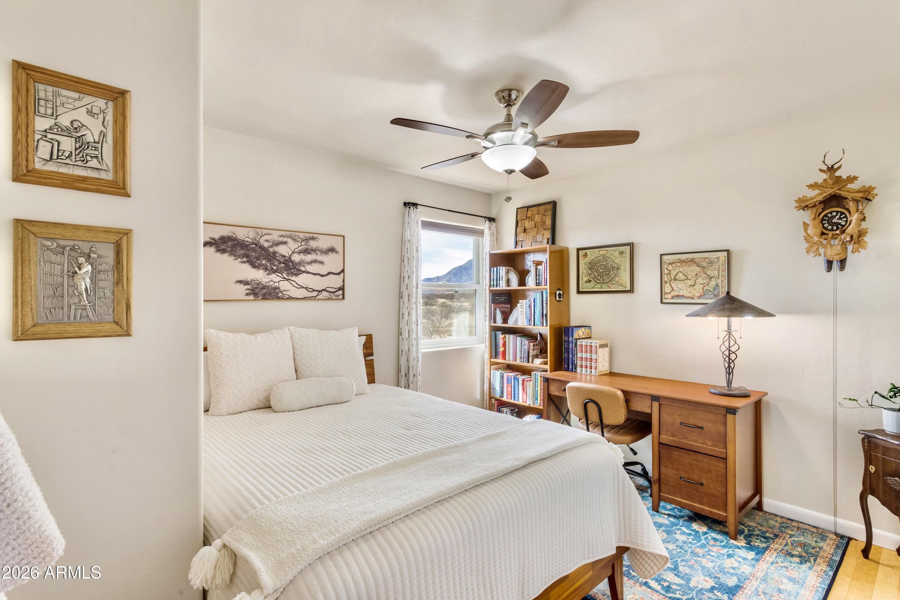 8541 South Almosta Ranch Road Hereford, AZ 85615 - Photo 32 of 53 a bedroom with a bed and furniture