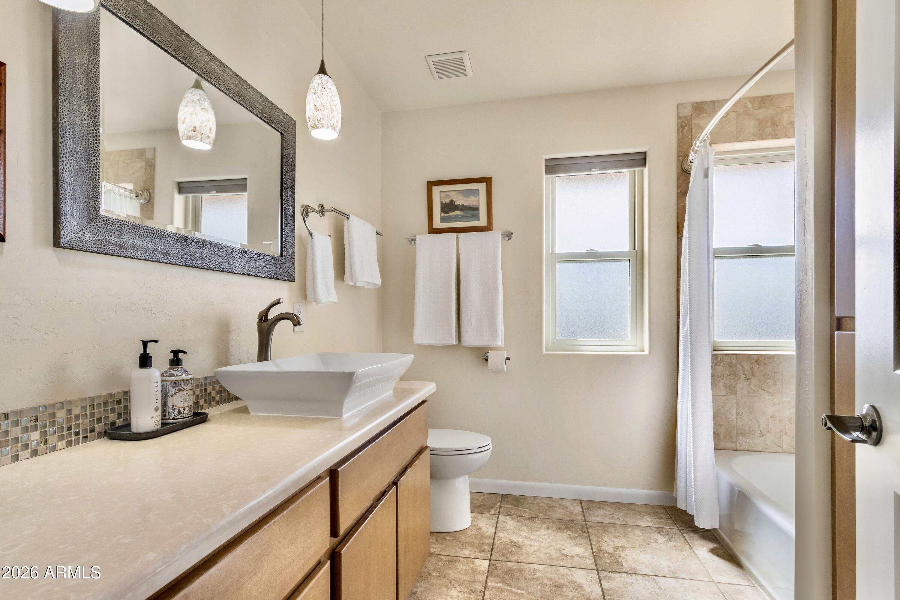 8541 South Almosta Ranch Road Hereford, AZ 85615 - Photo 33 of 53 a bathroom with a sink and a mirror
