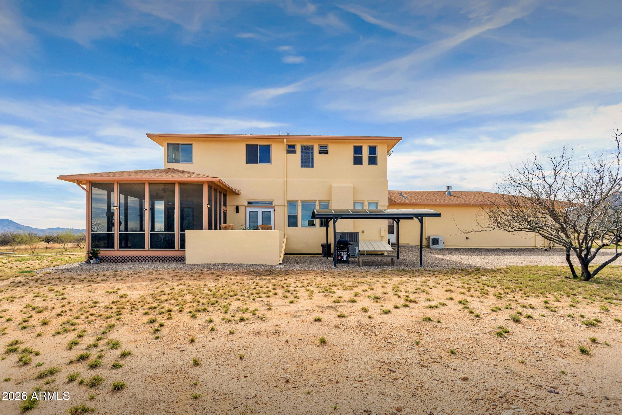 8541 South Almosta Ranch Road Hereford, AZ 85615 - Photo 45 of 53 a view of a house with a yard