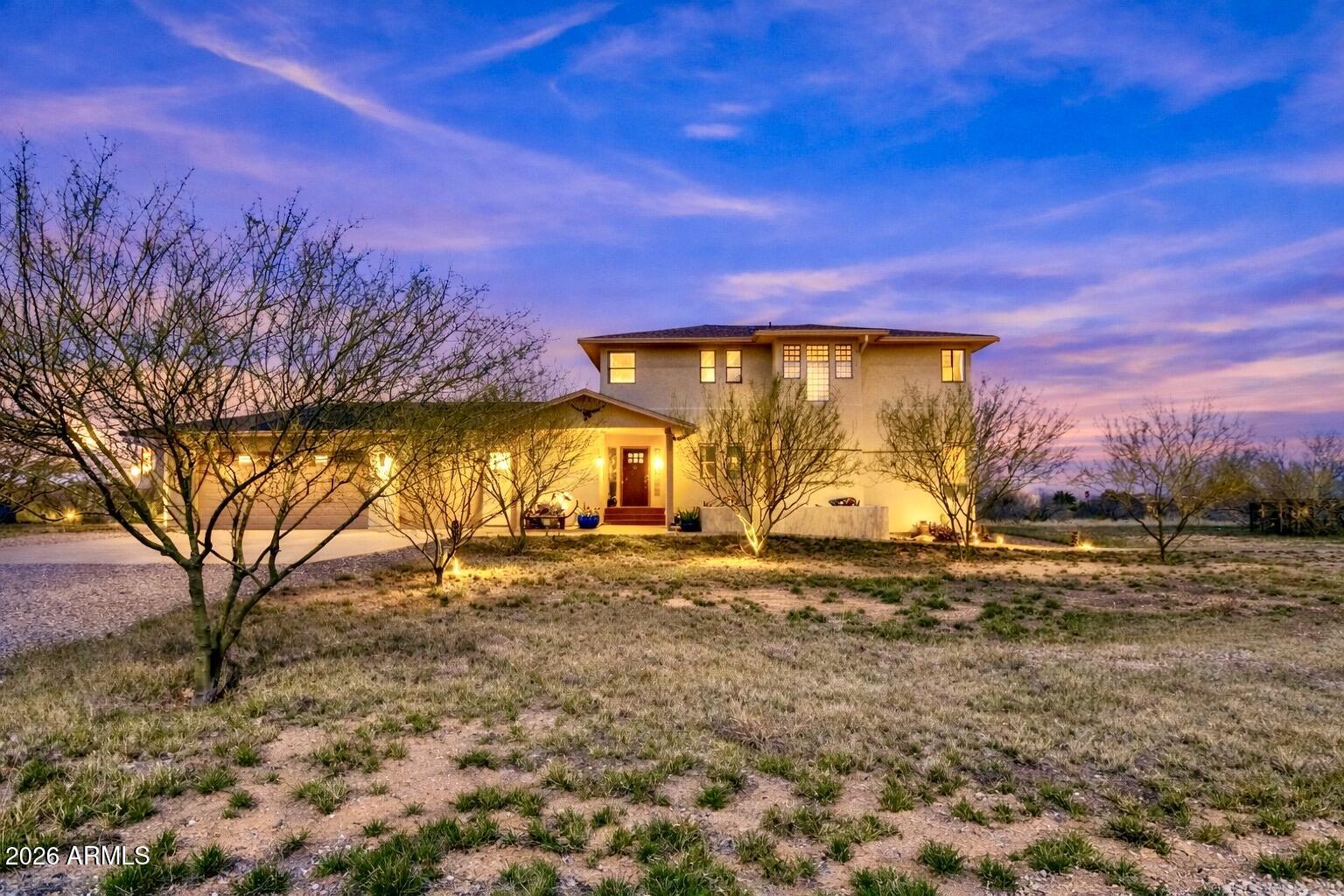 8541 South Almosta Ranch Road Hereford, AZ 85615 - Photo 50 of 53 a view of a yard with a tree