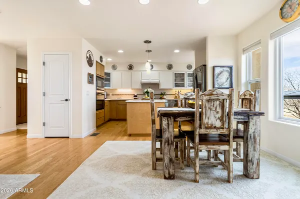 a view of a living room and kitchen