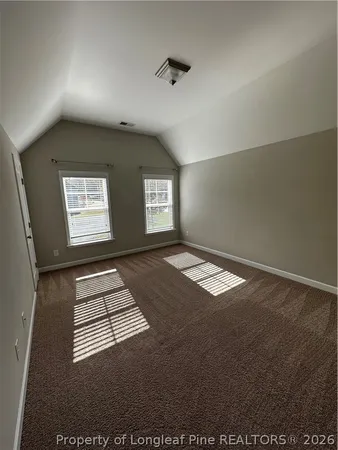 view of an empty room with windows
