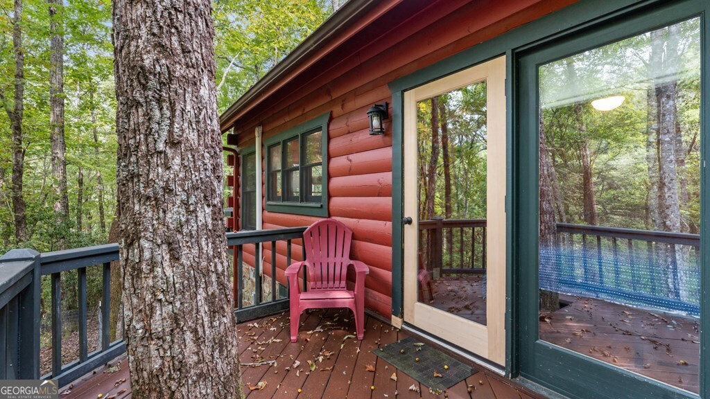 390 Butler Creek Road, Unit 10 Cherry Log, GA 30522 - Photo 21 of 27 a view of a two chairs in the balcony