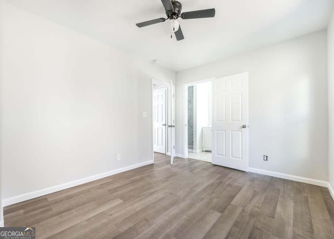 114 Emily Street Macon, GA 31204 - Photo 14 of 24 wooden floor in an empty room
