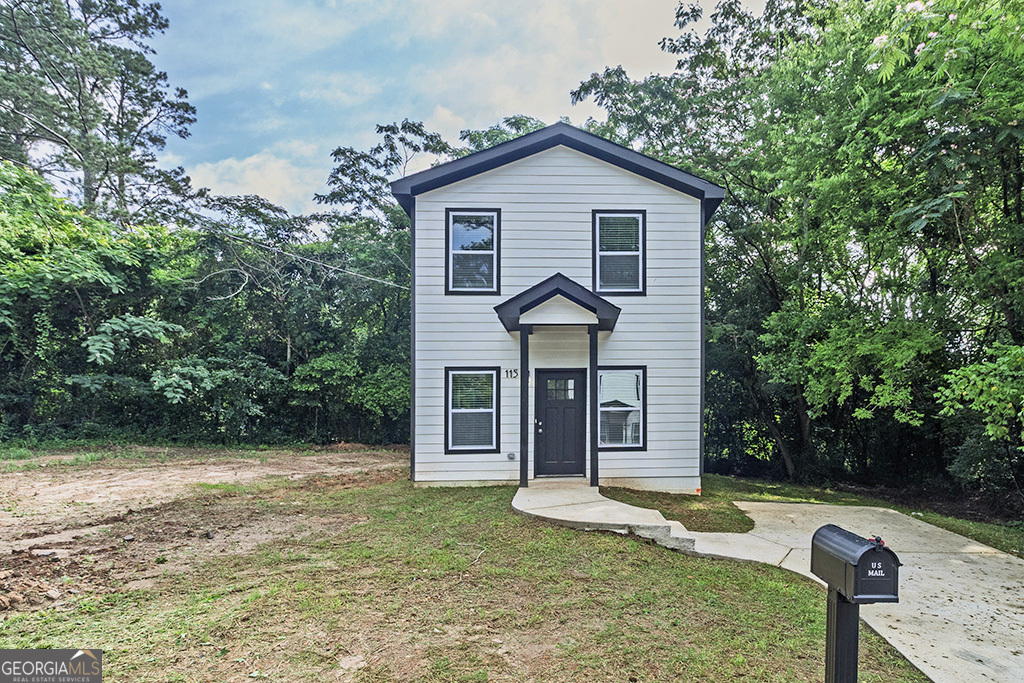 114 Emily Street Macon, GA 31204 - Photo 2 of 24 a front view of a house with garden